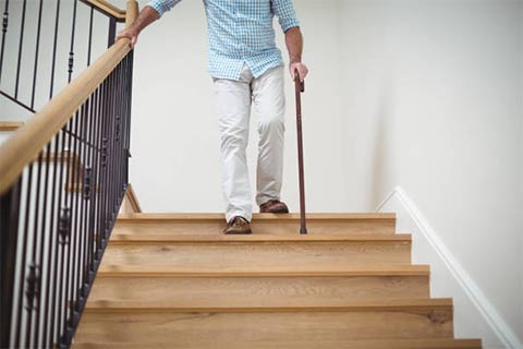 man going down a stairs