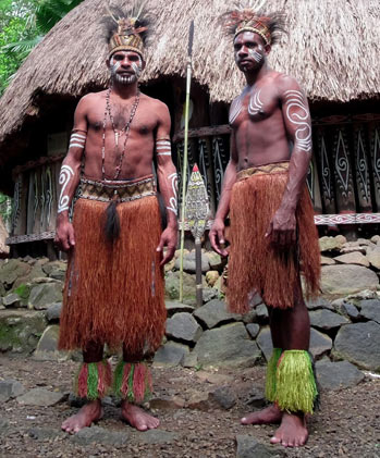 Men wearing tribal clothing